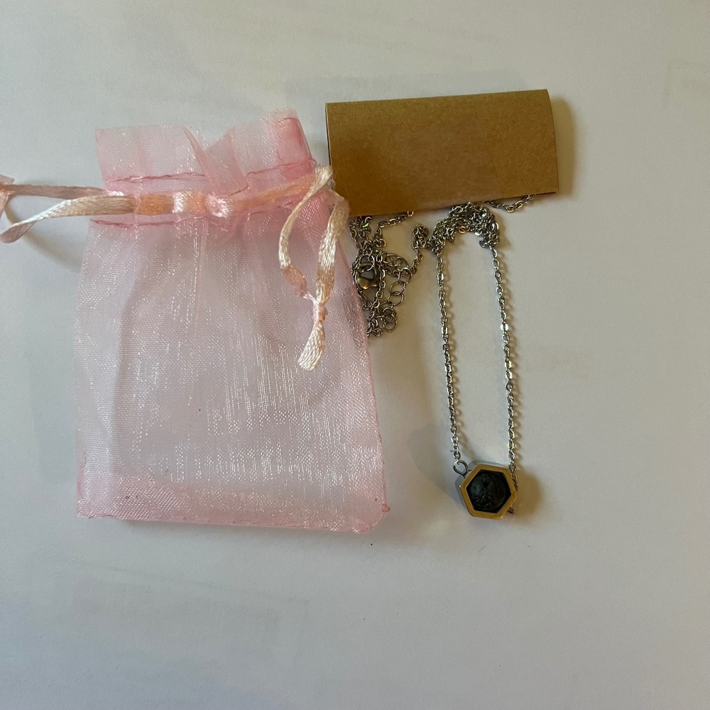 Silver lava stone essential oil necklace; 18 inches long; NWOT